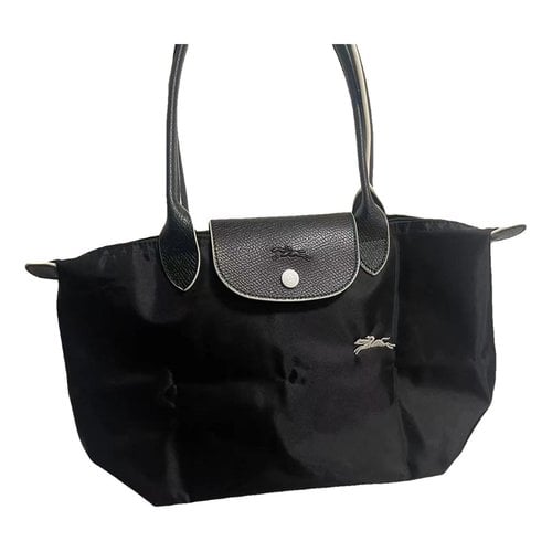 Pre-owned Longchamp Vinyl Clutch Bag In Black