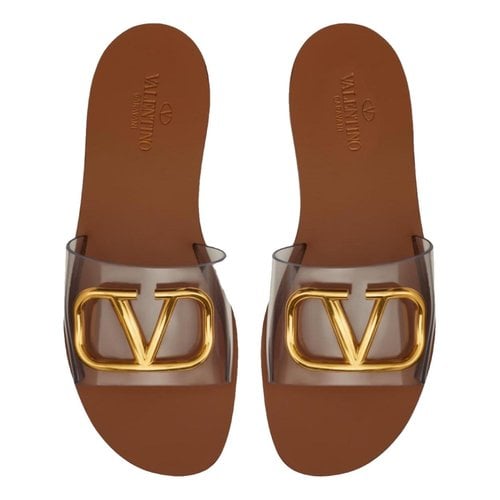 Pre-owned Valentino Garavani Vlogo Leather Mules In Brown