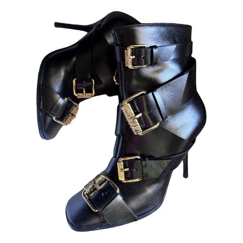 Pre-owned Moschino Pony-style Calfskin Boots In Black