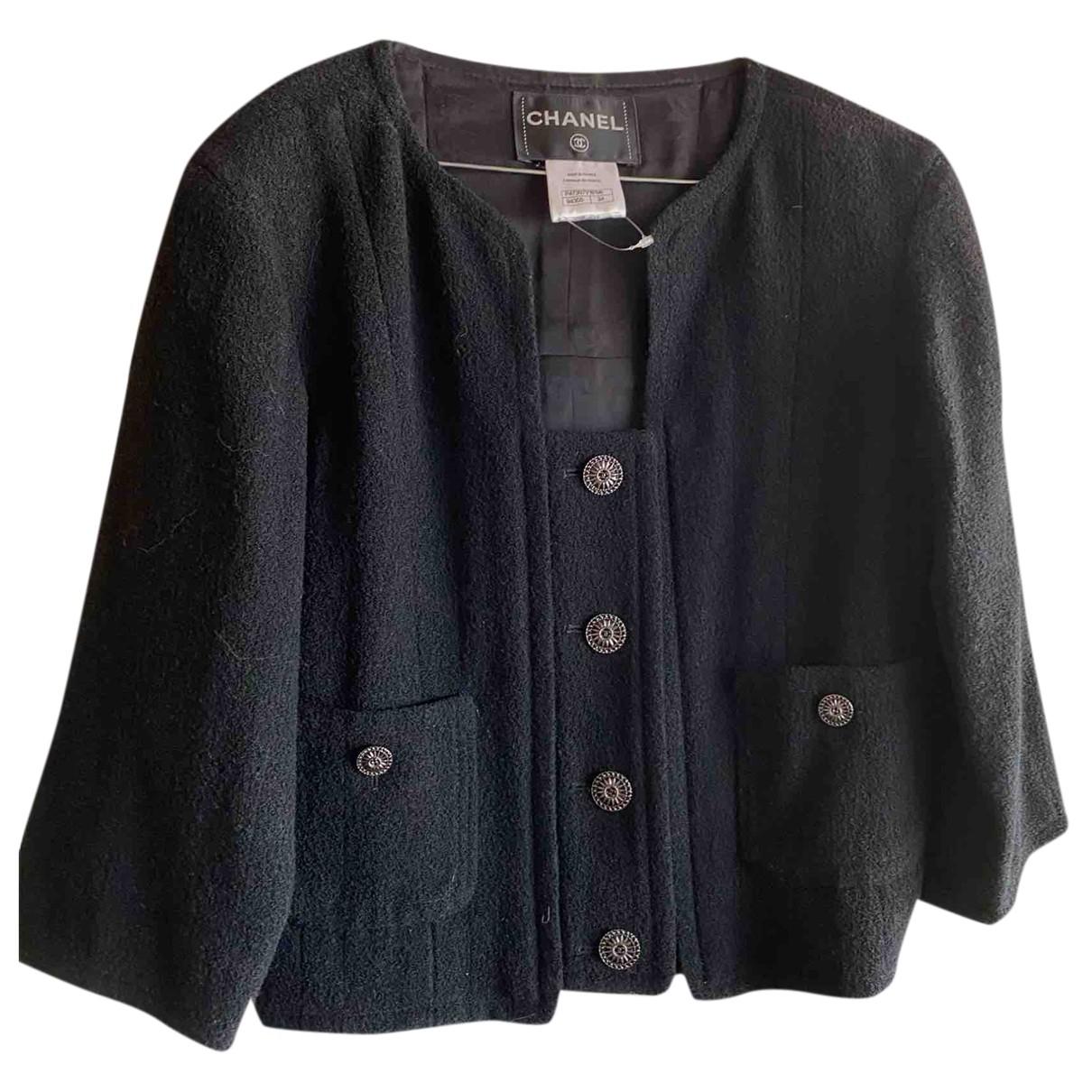 La petite veste noire short vest Chanel Blue size 42 FR in Cotton - 32794345