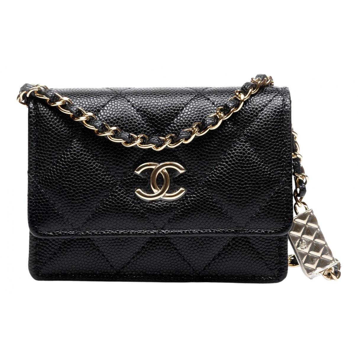 Wallet on chain leather crossbody bag Chanel Black in Leather - 22323721