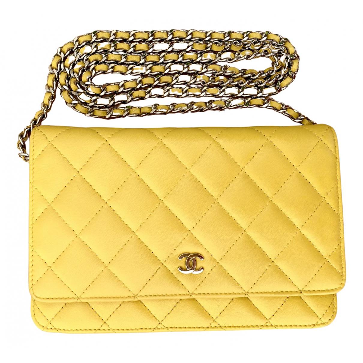 Wallet on chain timeless/classique leather crossbody bag Chanel Yellow in  Leather - 25767006