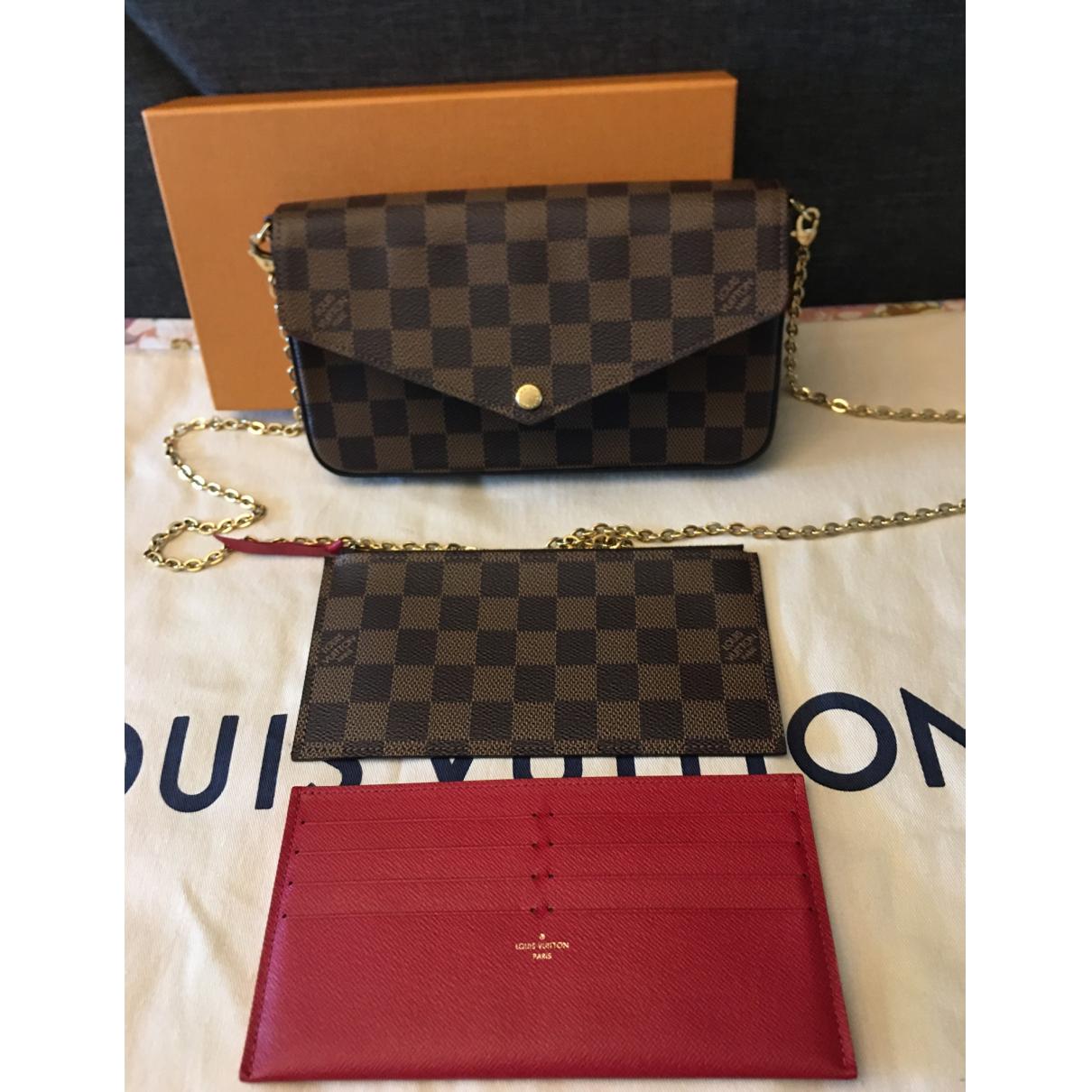 Nile cloth crossbody bag Louis Vuitton Brown in Cloth - 38255889