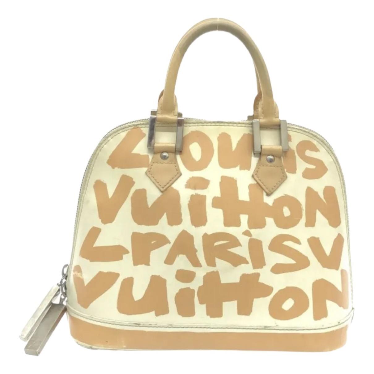 Alma graffiti leather handbag Louis Vuitton Beige in Leather - 27696226