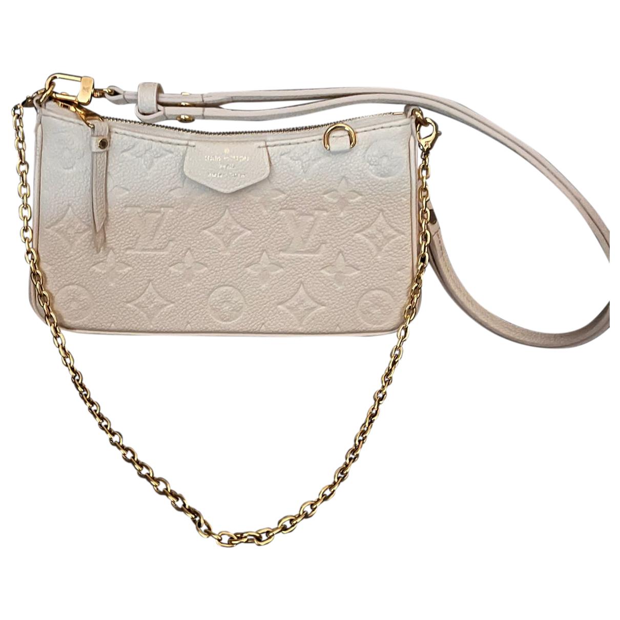 Easy pouch on strap leather handbag Louis Vuitton Beige in Leather -  32943697