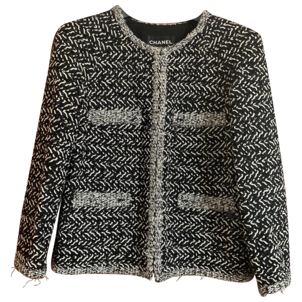 La petite veste noire tweed jacket Chanel Multicolour size 46 FR in Tweed -  35949372