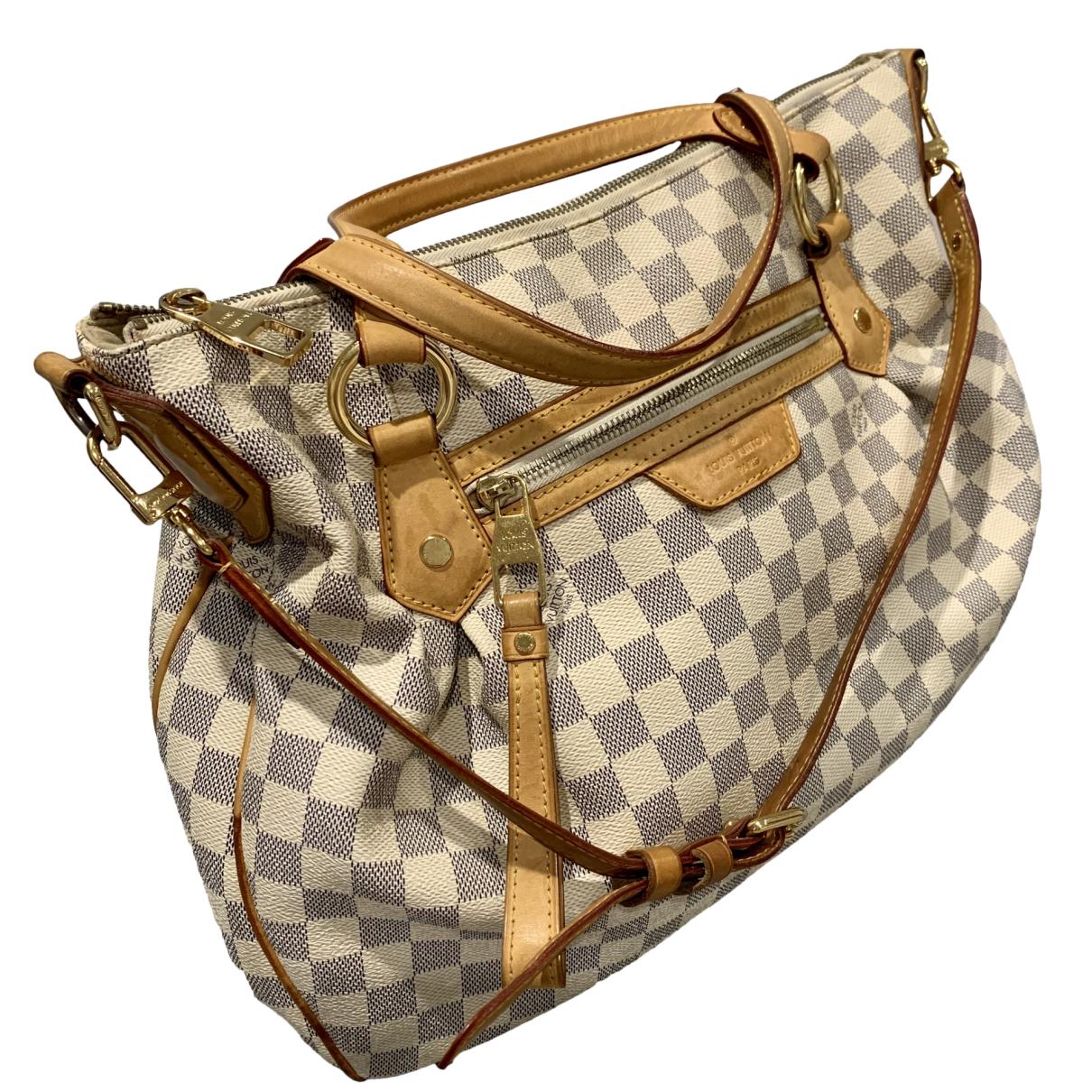 Totally cloth handbag Louis Vuitton White in Cloth - 27446987