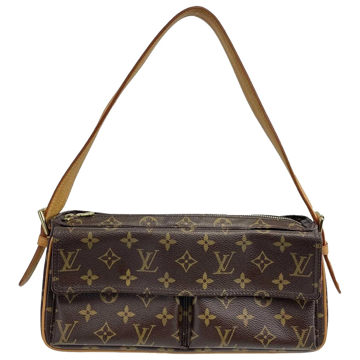 cloth handbag Louis Vuitton Brown in Cloth - 34706386
