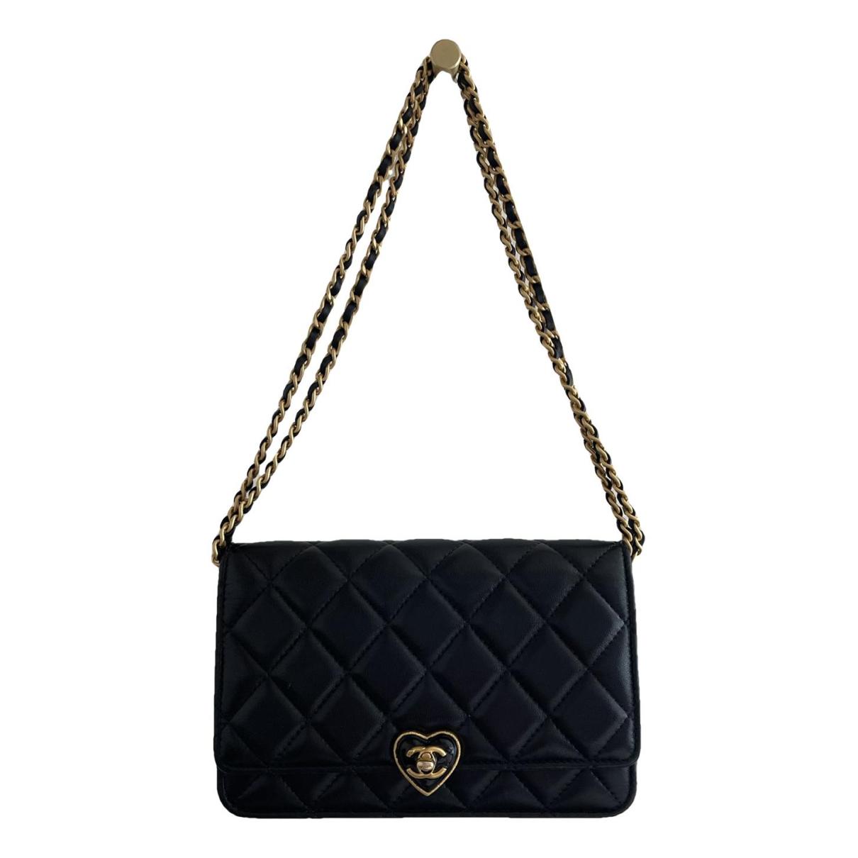 Wallet on chain leather crossbody bag Chanel Black in Leather - 34935966