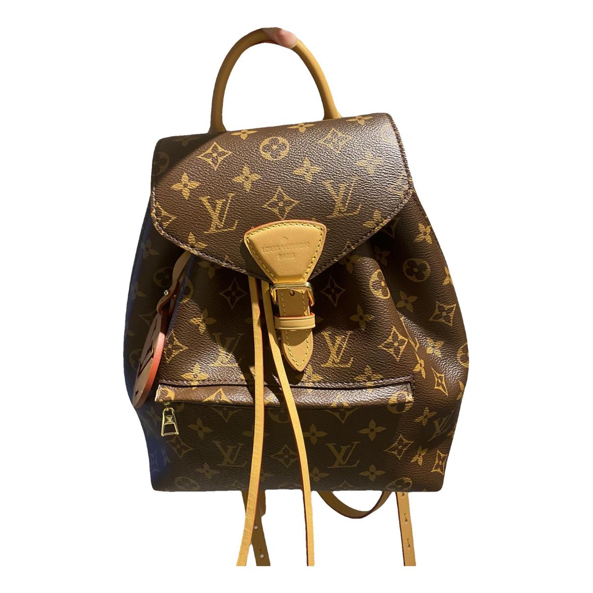 Palm springs cloth backpack Louis Vuitton Brown in Cloth - 24969887