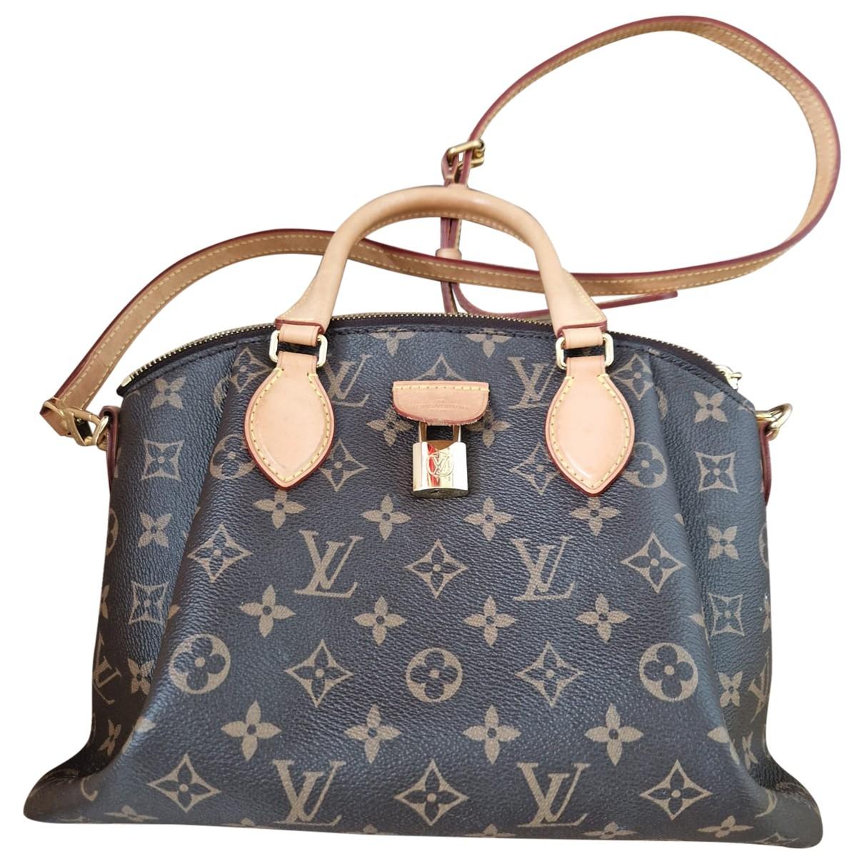 Rivoli leather crossbody bag Louis Vuitton Brown in Leather - 35657487