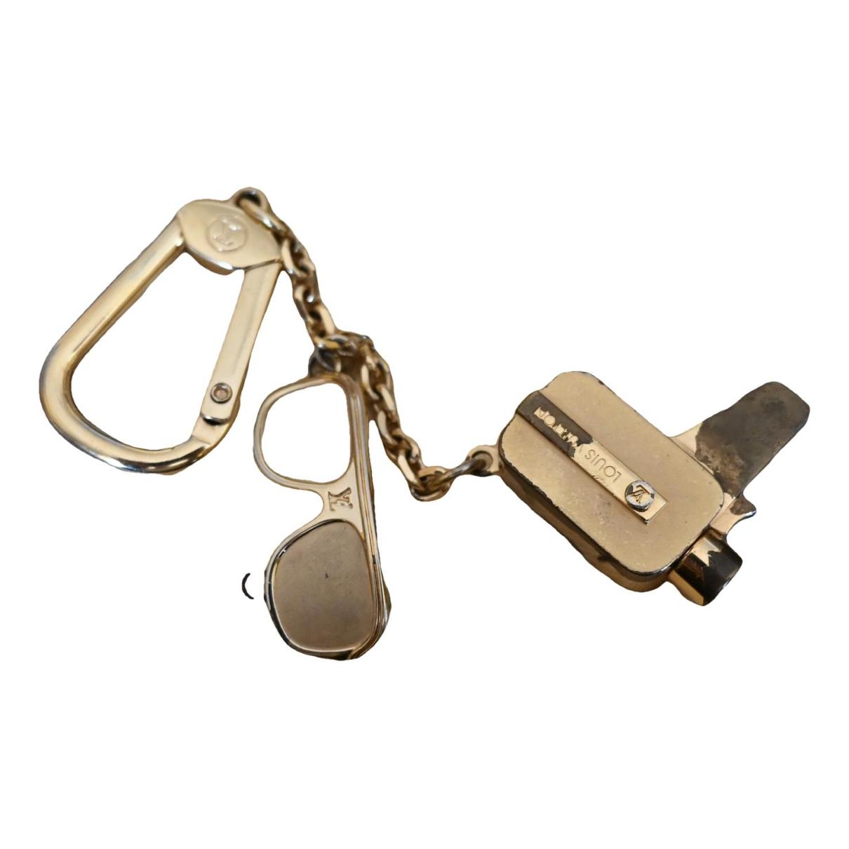 Bag charm Louis Vuitton Metallic in Not specified - 24969831