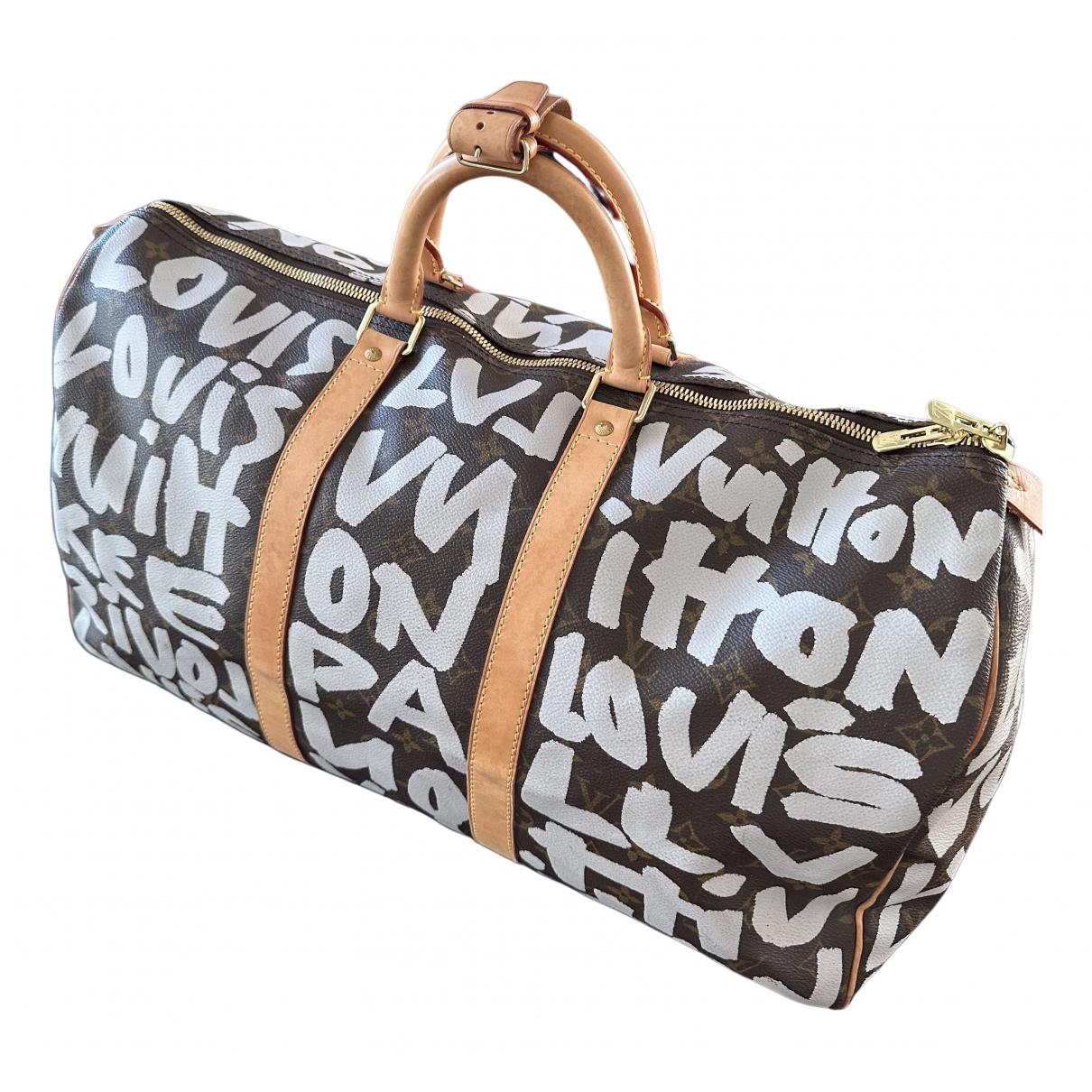 Keepall travel bag Louis Vuitton Multicolour in Plastic - 28216712