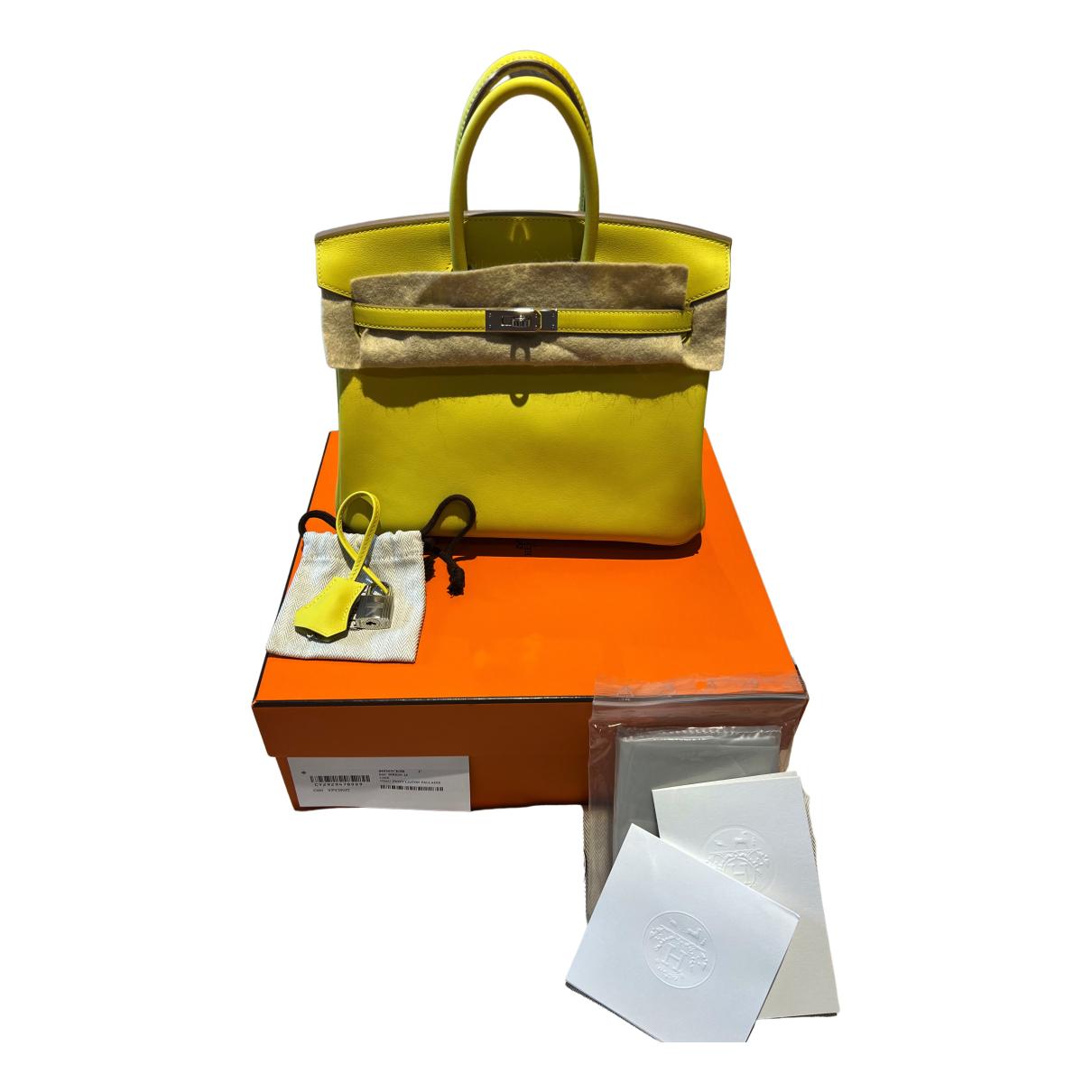 Sold at Auction: HERMÈS Handtasche BIRKIN BAG 25 - IN AND OUT.