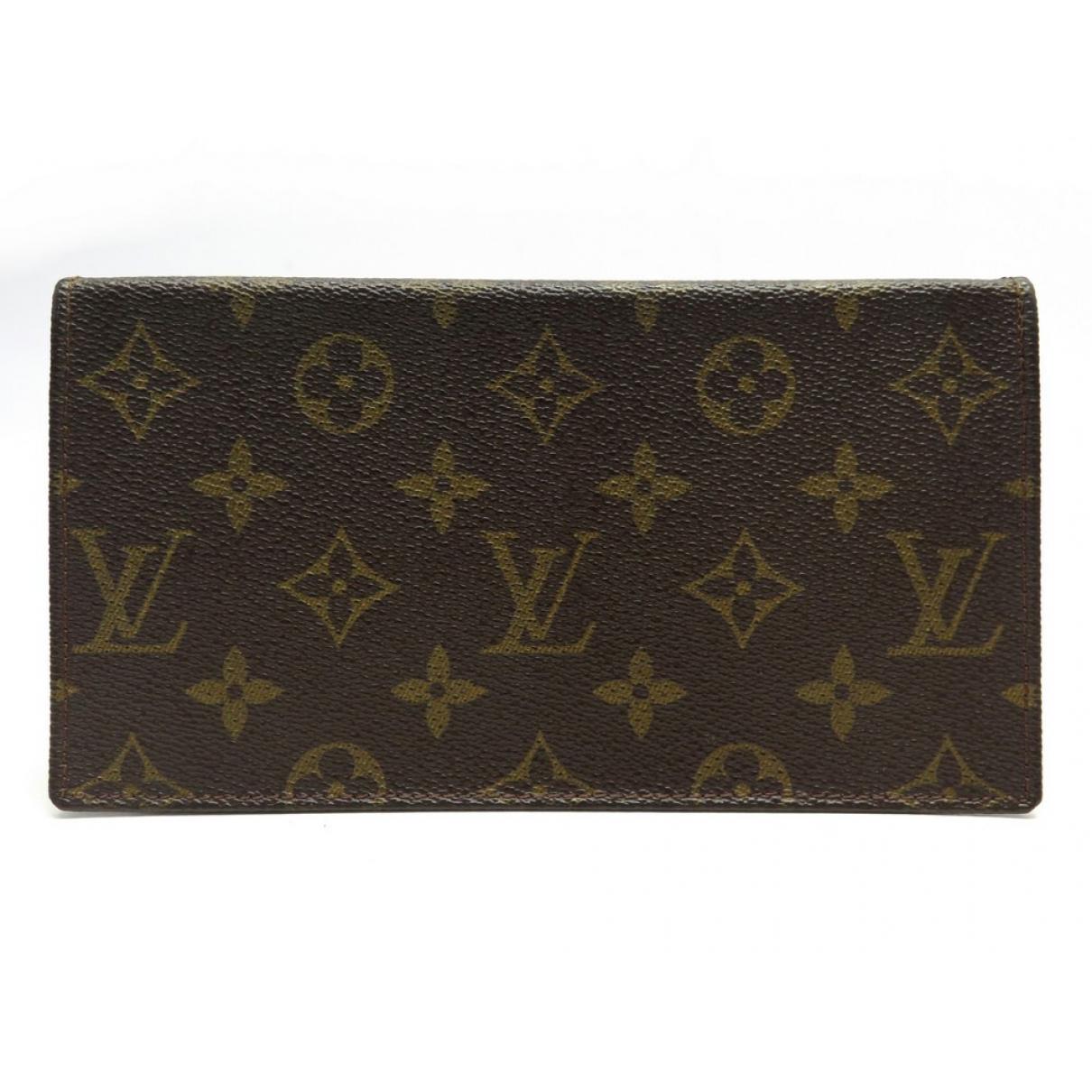 Cloth purse Louis Vuitton Brown in Cloth - 37559093