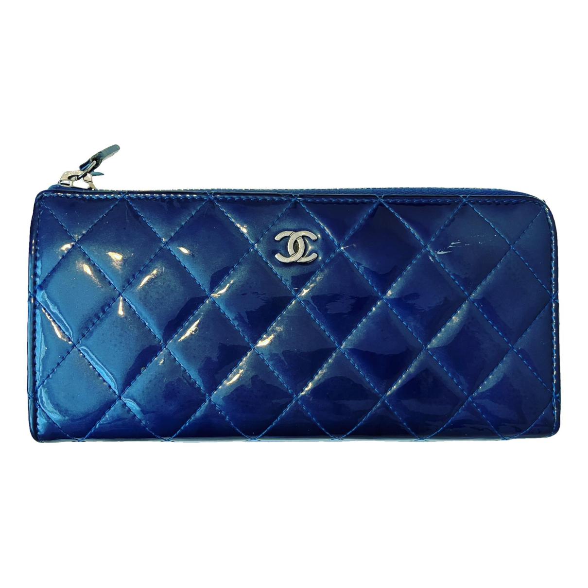 Leather wallet Chanel Blue in Leather - 36876147