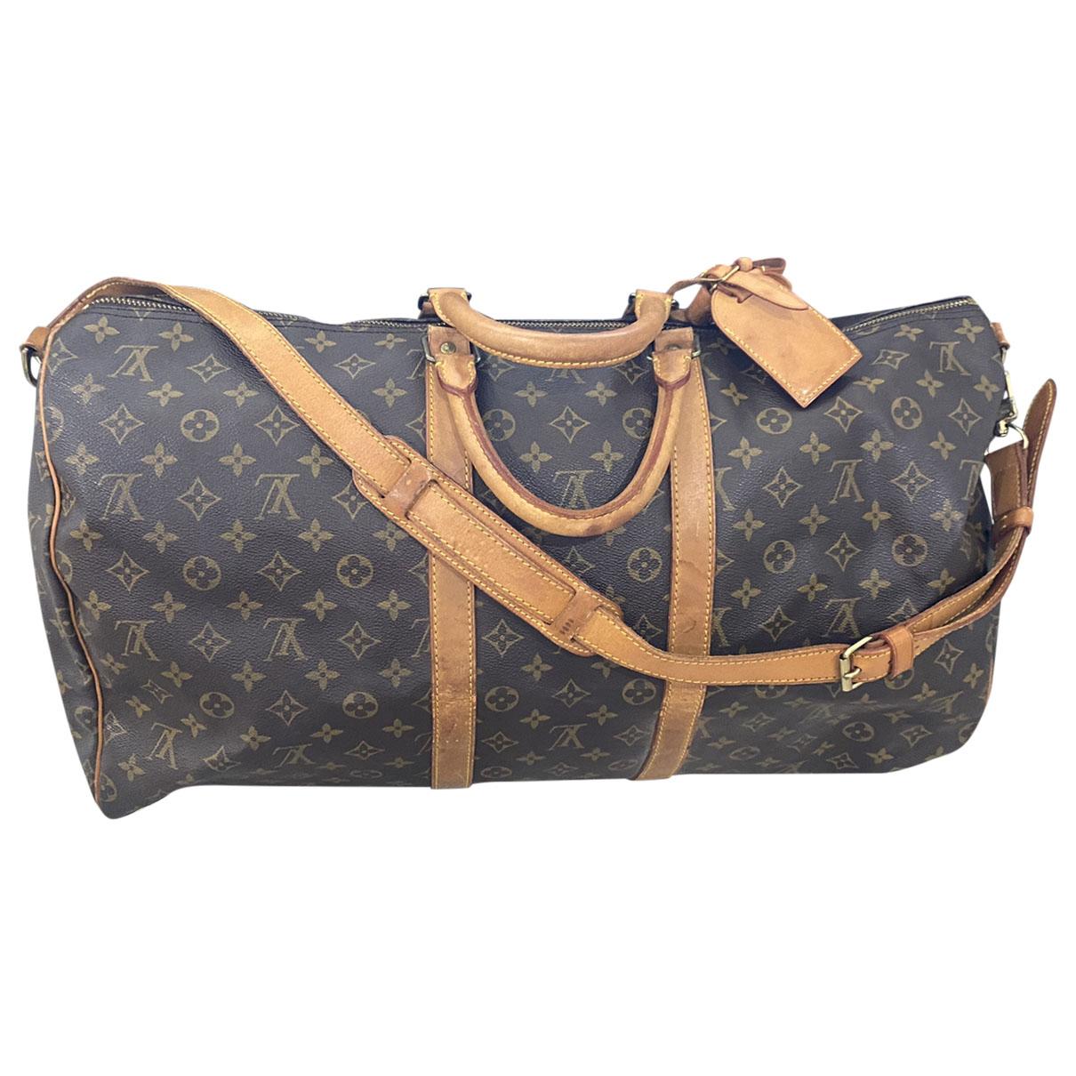 Leather travel bag Louis Vuitton Brown in Leather - 37402579
