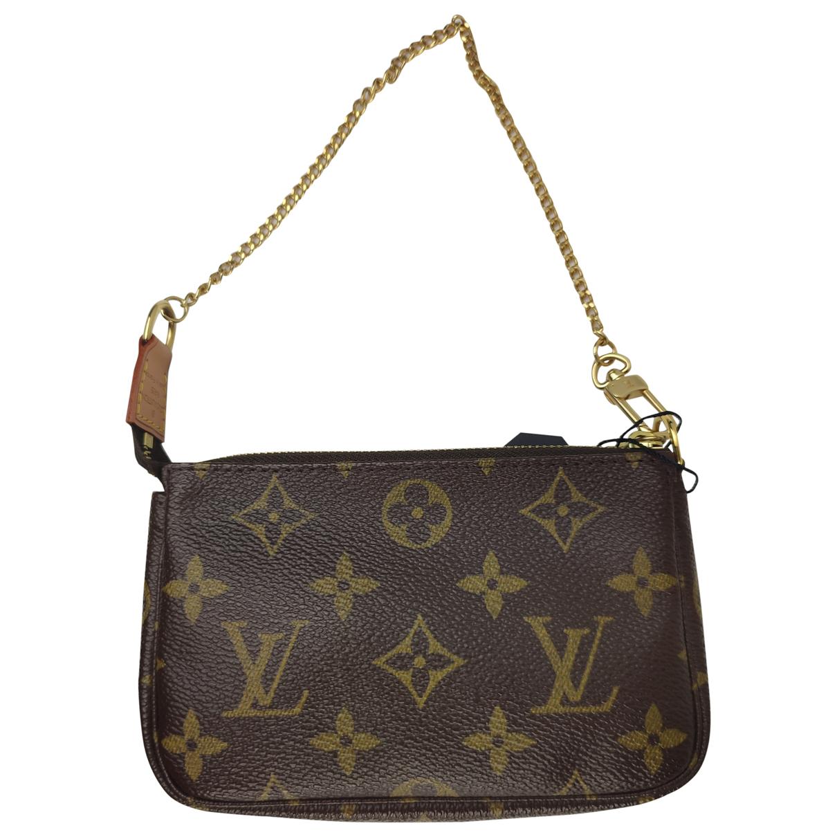 Pochette accessoire cloth handbag Louis Vuitton Brown in Cloth - 26327841