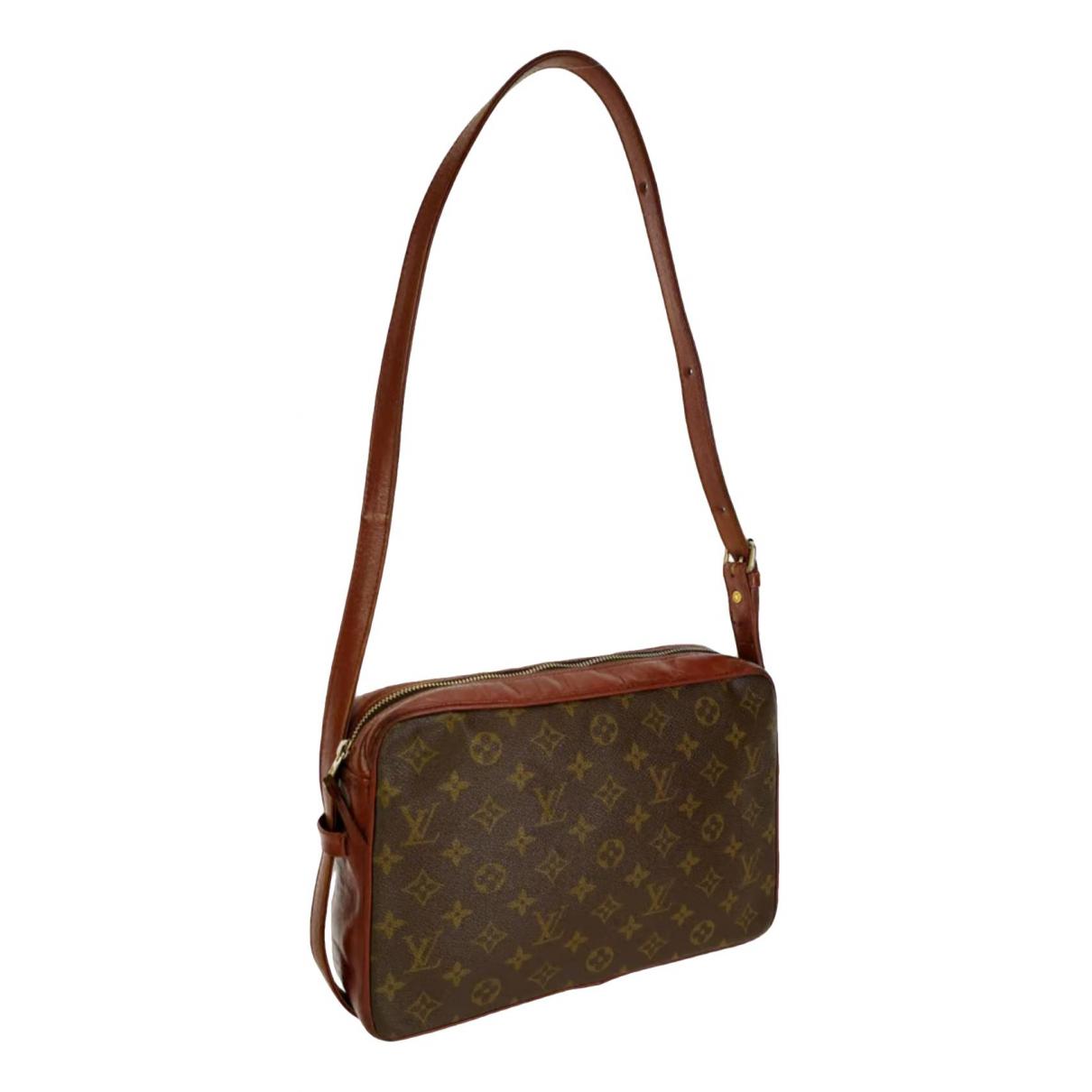 Partition leather handbag Louis Vuitton Brown in Leather - 17054909