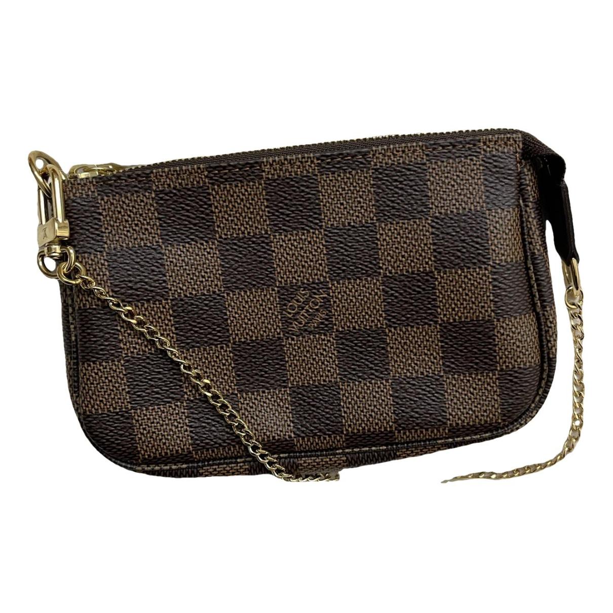 Pochette accessoire cloth handbag Louis Vuitton Brown in Cloth - 20352857