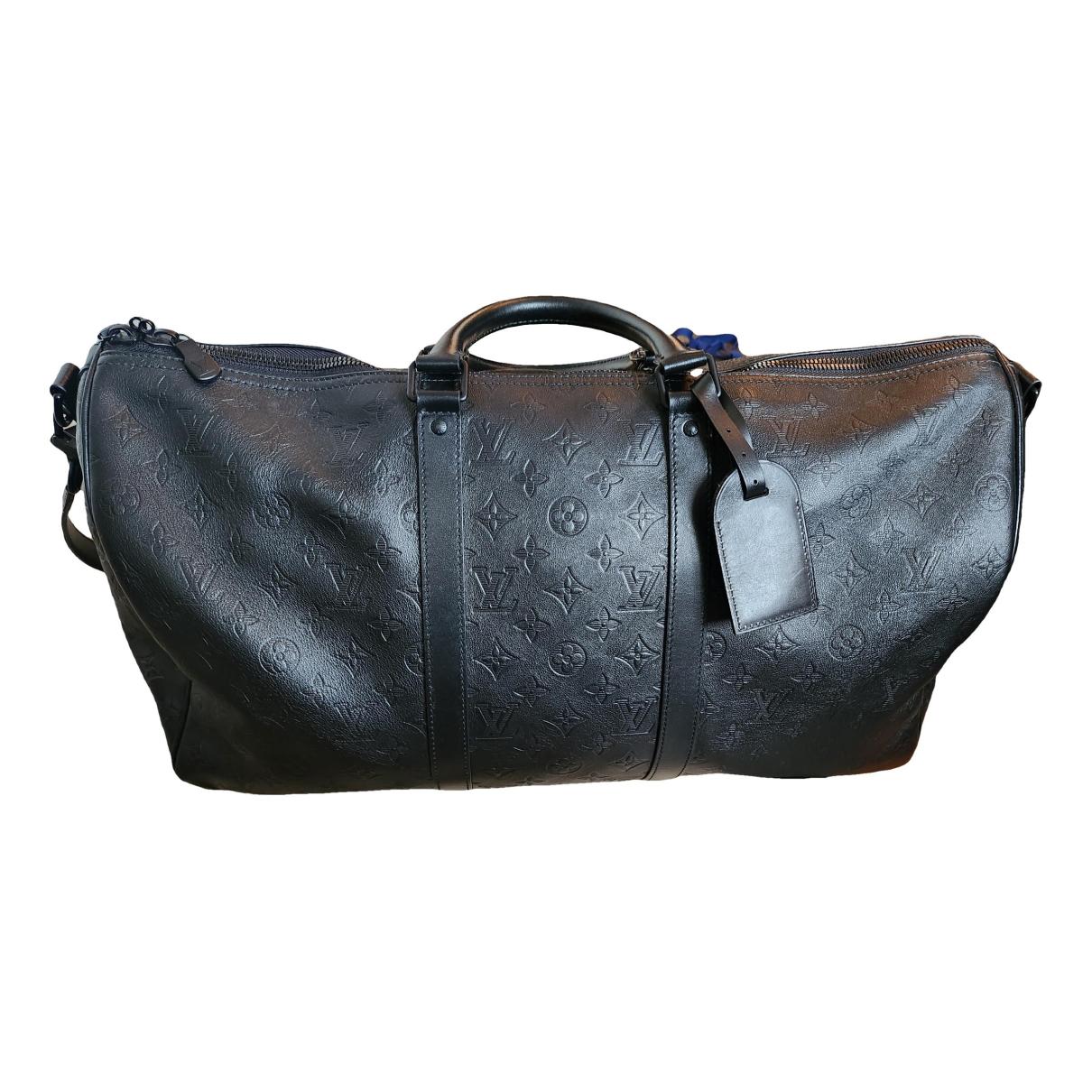 Keepall leather travel bag Louis Vuitton Black in Leather - 32591033