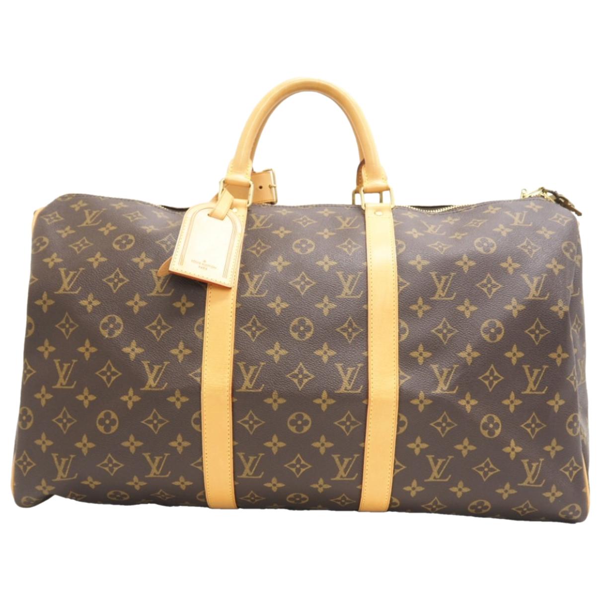 Cloth travel bag Louis Vuitton Brown in Cloth - 25628564