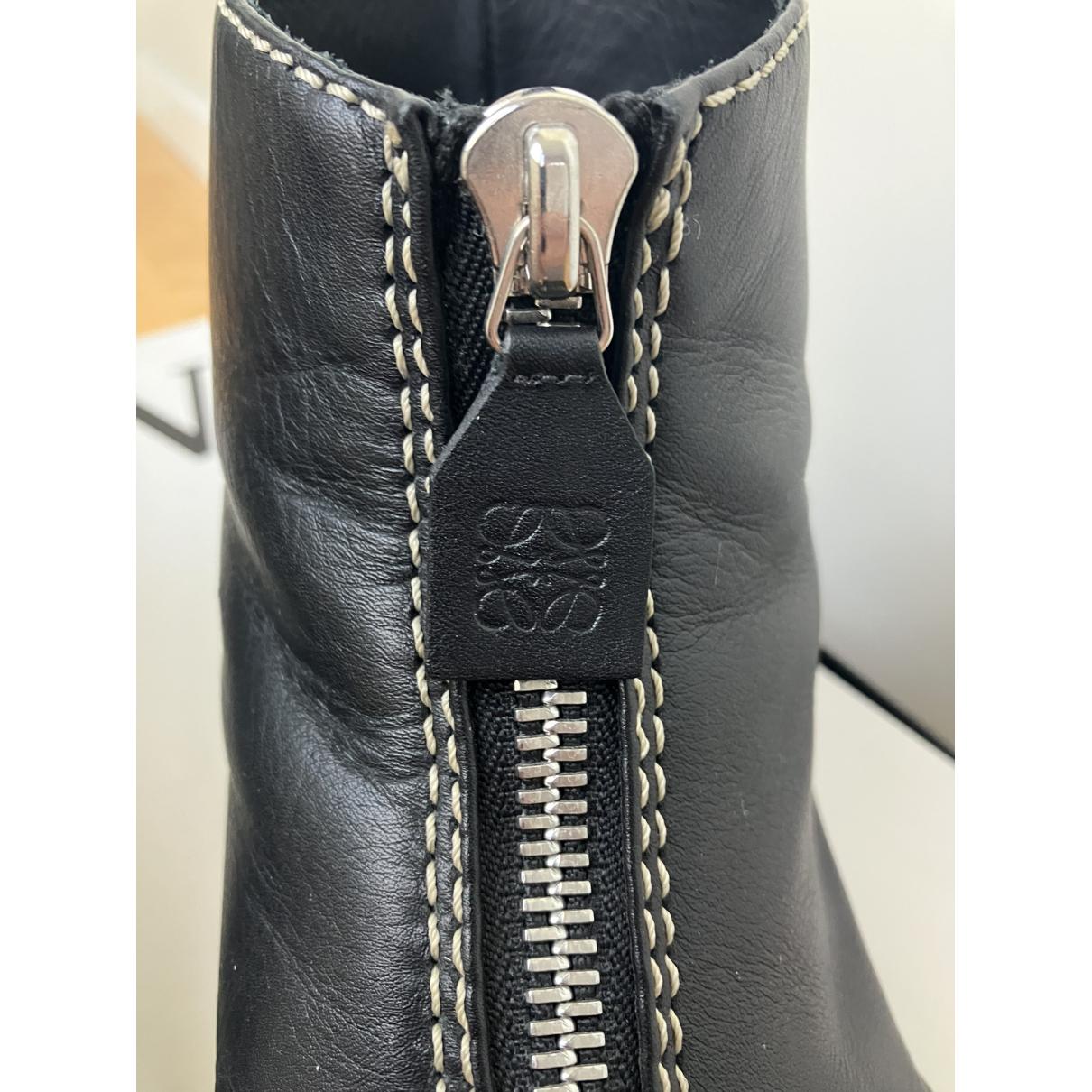 https://images.vestiairecollective.com/cdn-cgi/image/q=75,f=auto,/produit/black-leather-loewe-boots-34456045-3_2.jpg?secret=VC-e9eee96a-a819-4431-ad12-d066be2626ef
