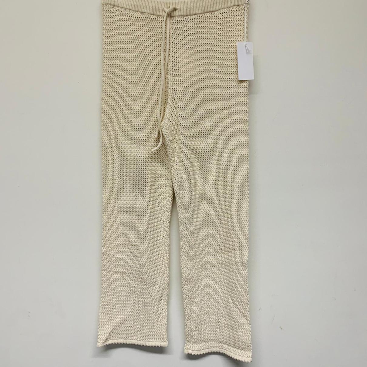https://images.vestiairecollective.com/cdn-cgi/image/q=75,f=auto,/produit/white-synthetic-reformation-trousers-35136158-12_2.jpg?secret=VC-e9eee96a-a819-4431-ad12-d066be2626ef