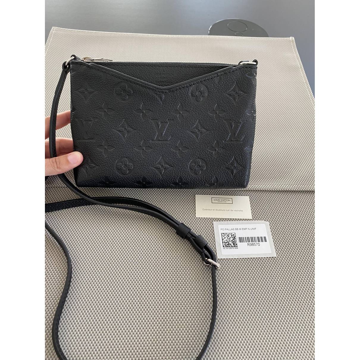 Louis Vuitton crossbody empreinte uniform purse.