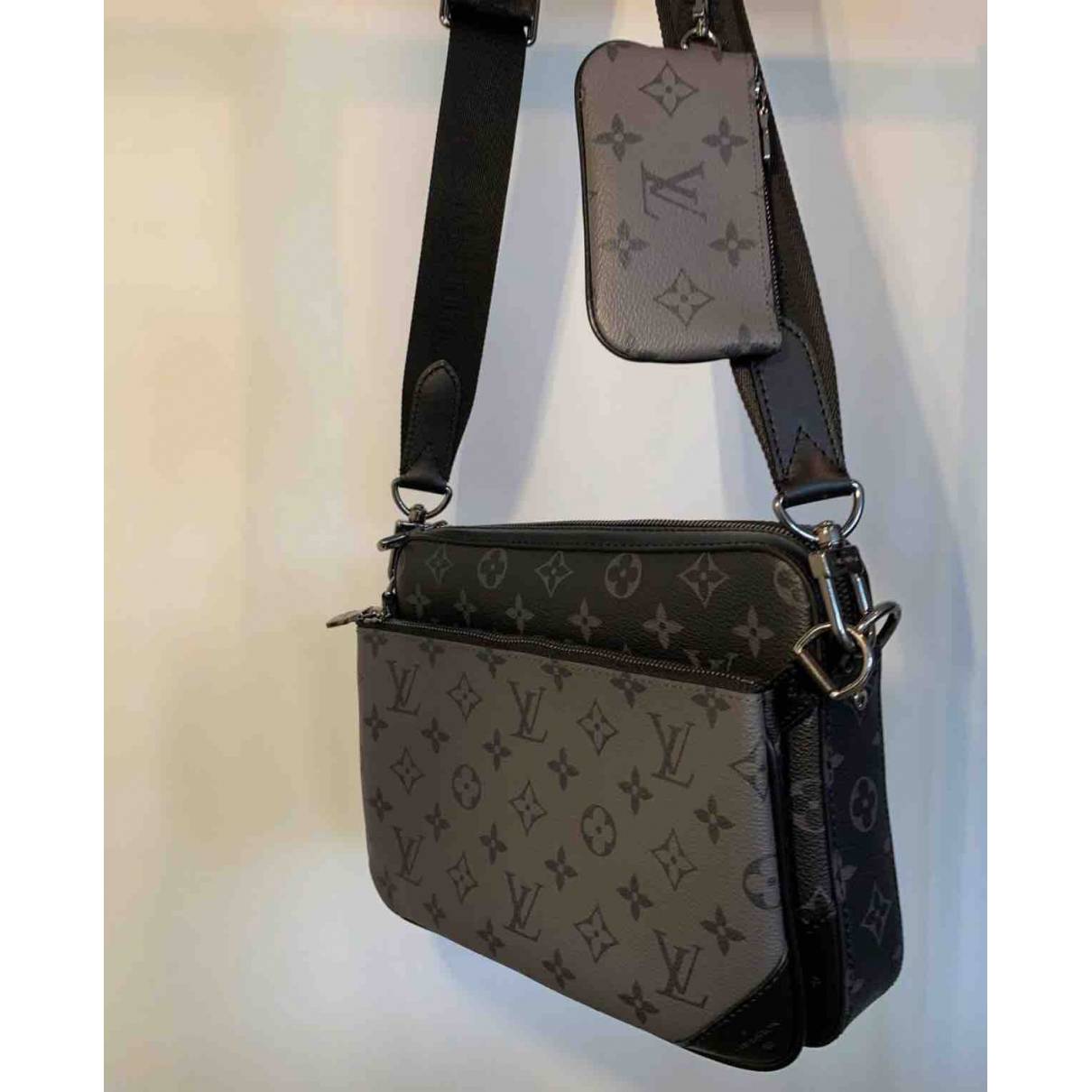Trio messenger cloth bag Louis Vuitton Black in Cloth - 14184739