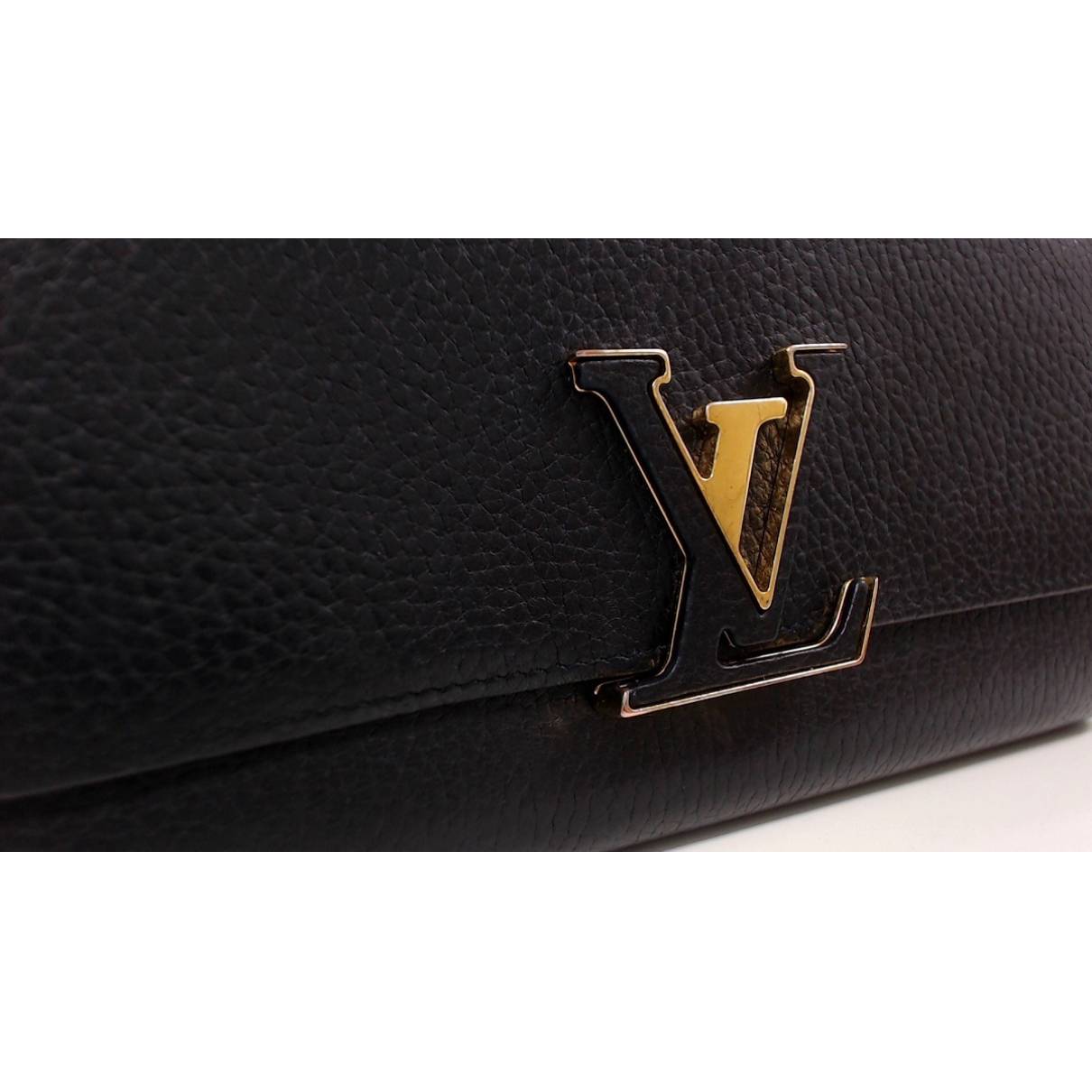Capucines leather wallet Louis Vuitton Black in Leather - 34973056