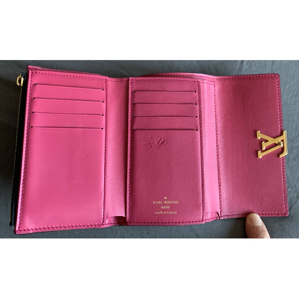pink and black louis vuittons wallet