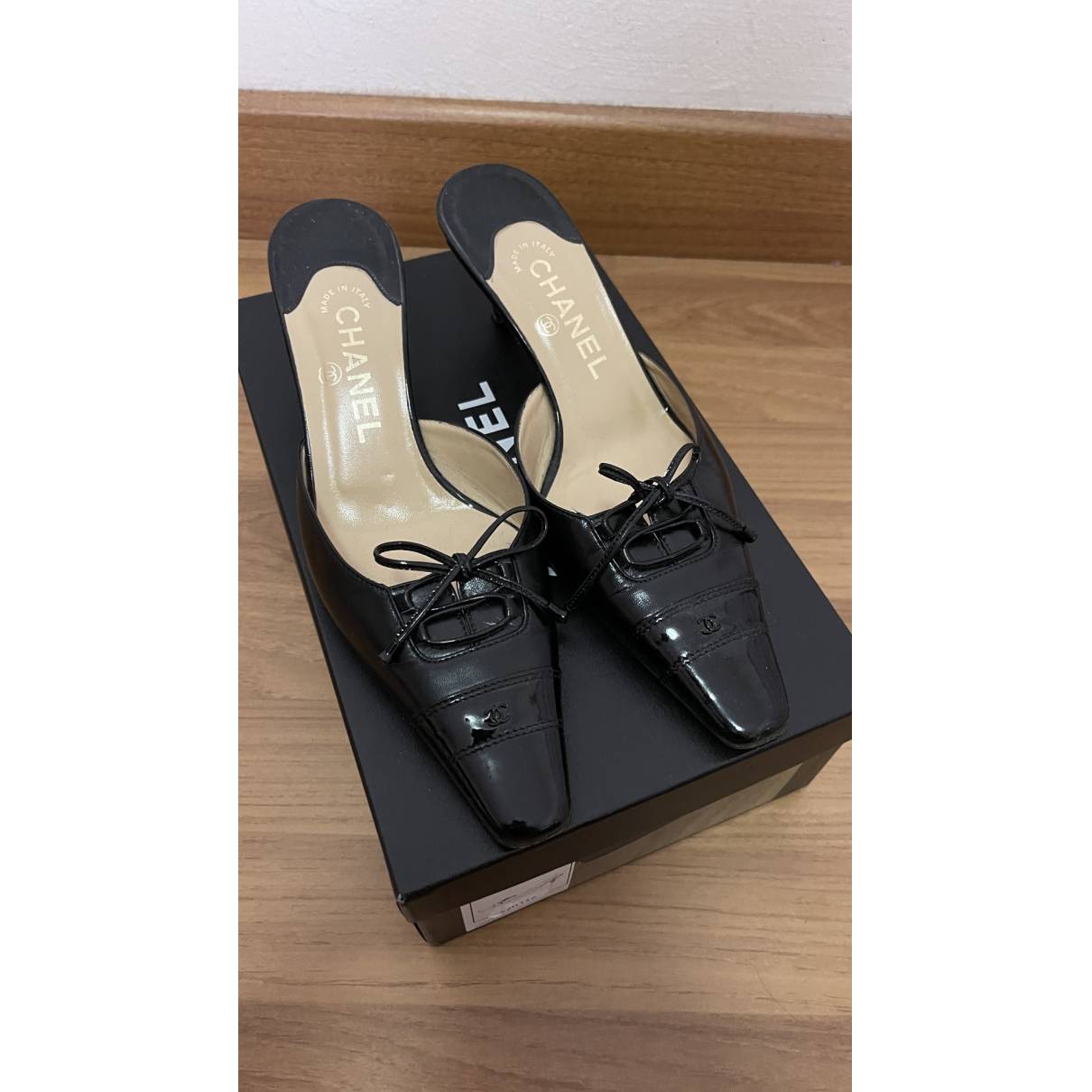 Leather mules & clogs Chanel Black size 38 EU in Leather - 35685839