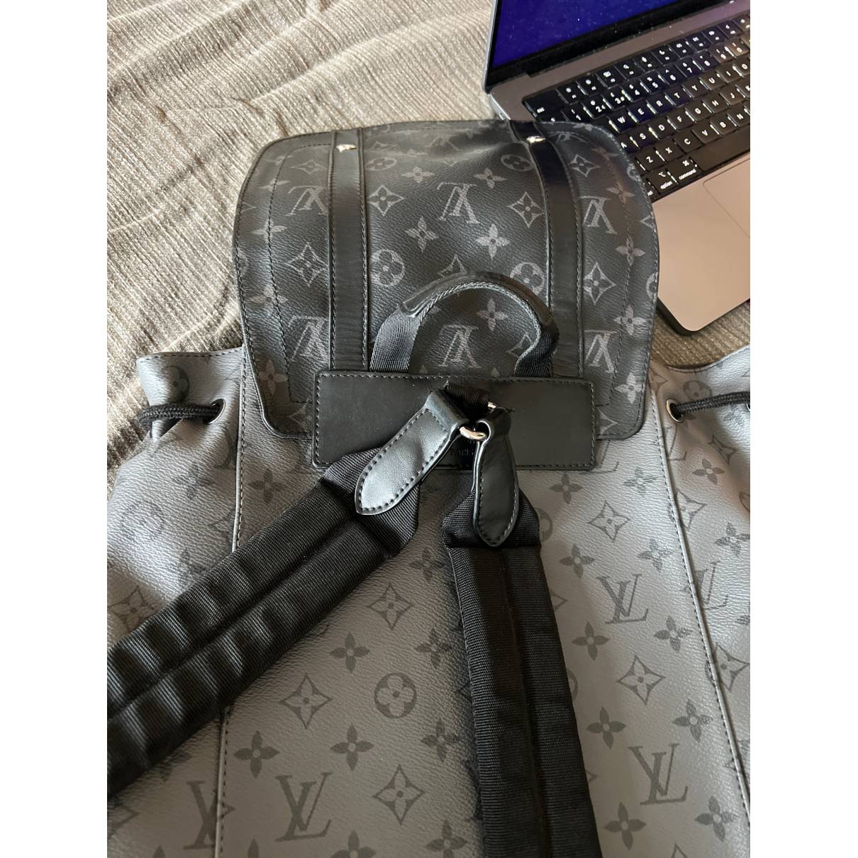 black leather louis vuitton backpack