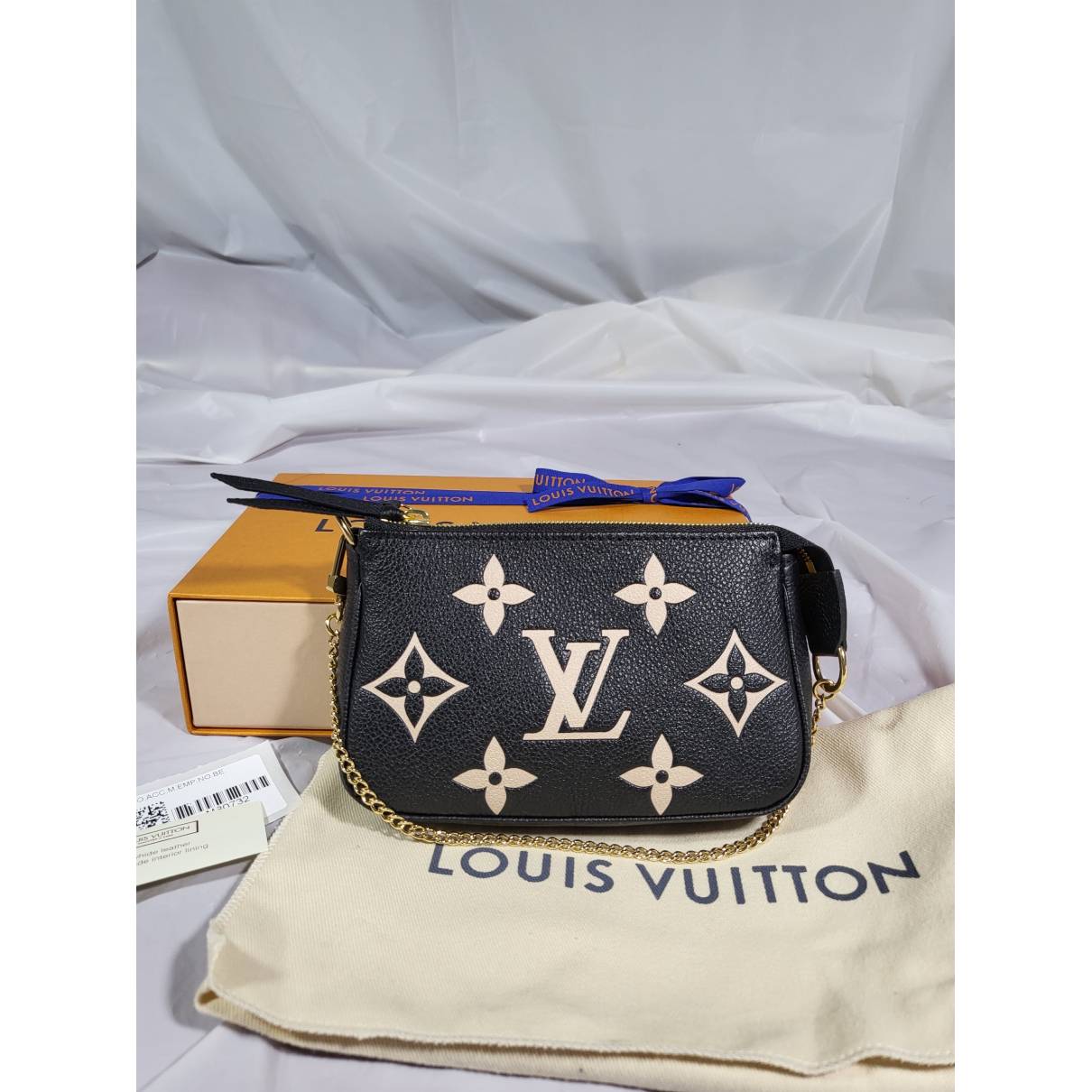 Louis Vuitton Mini Pochette in Black with Blue Monogram - SOLD