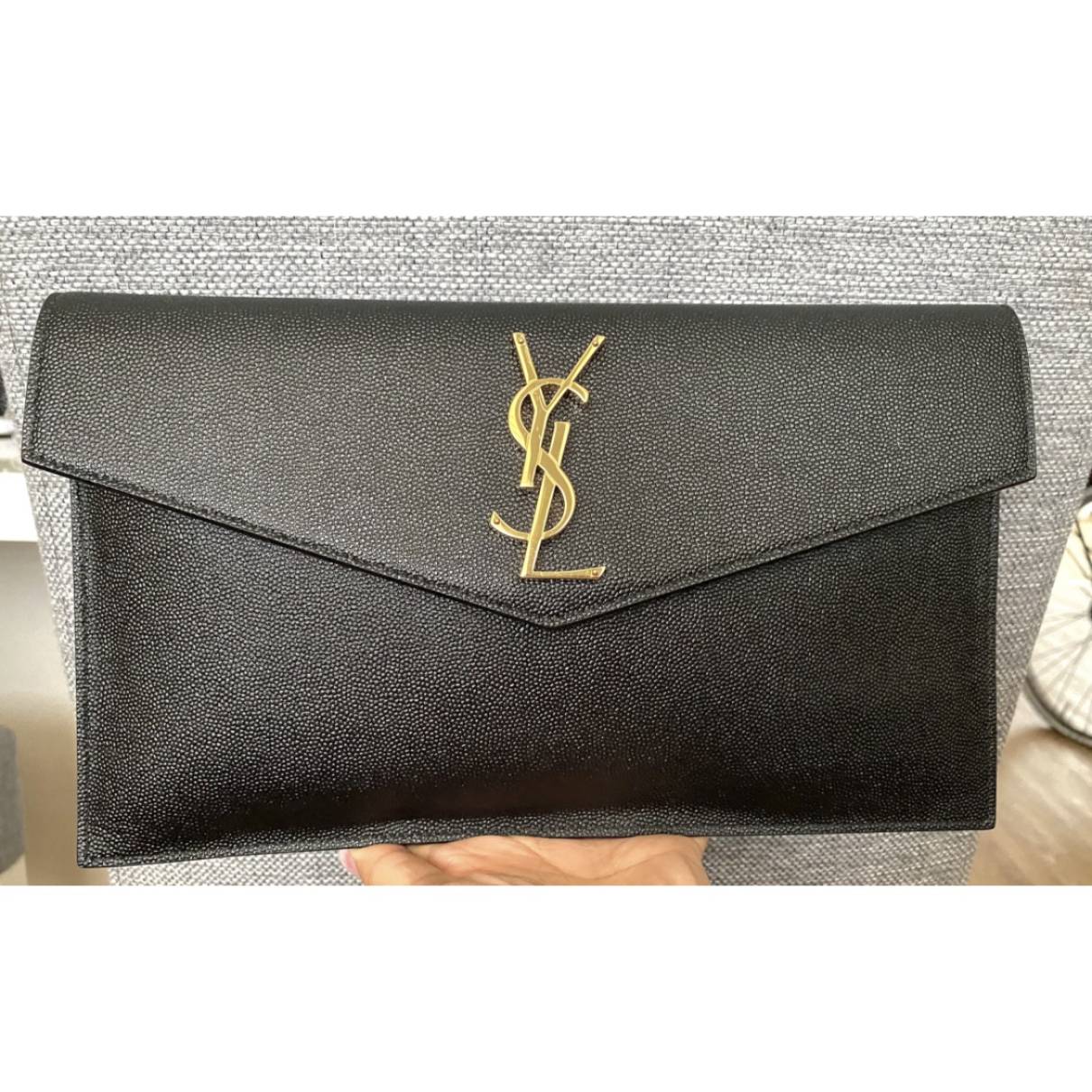 Uptown leather clutch bag Saint Laurent Black in Leather - 37341730