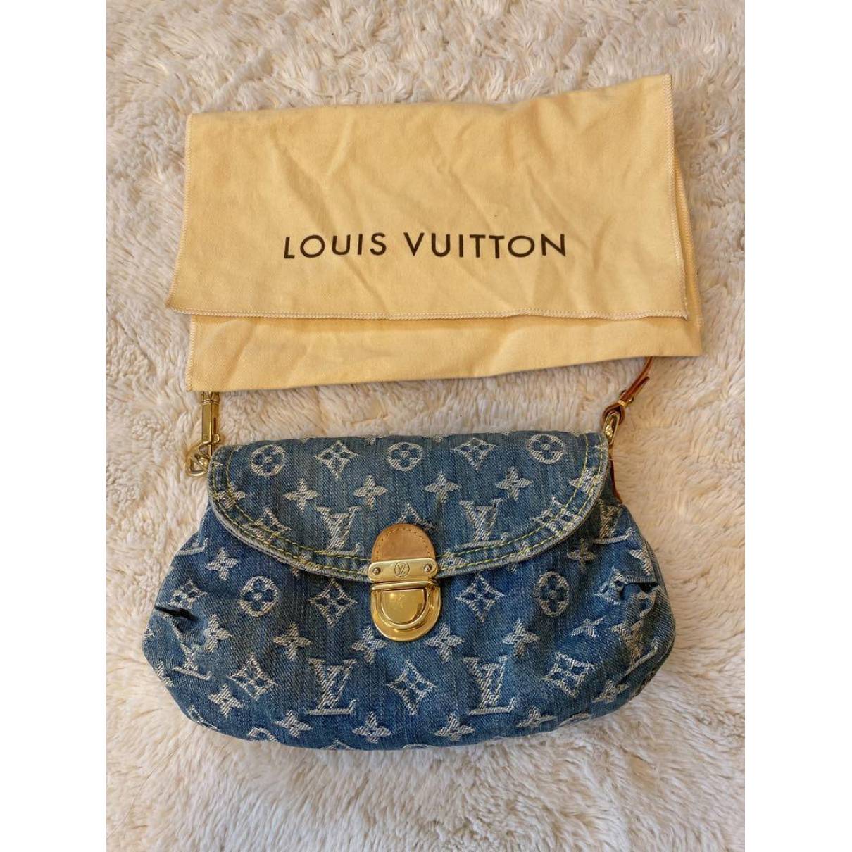 Pleaty handbag Louis Vuitton Blue in Denim - Jeans - 31878544