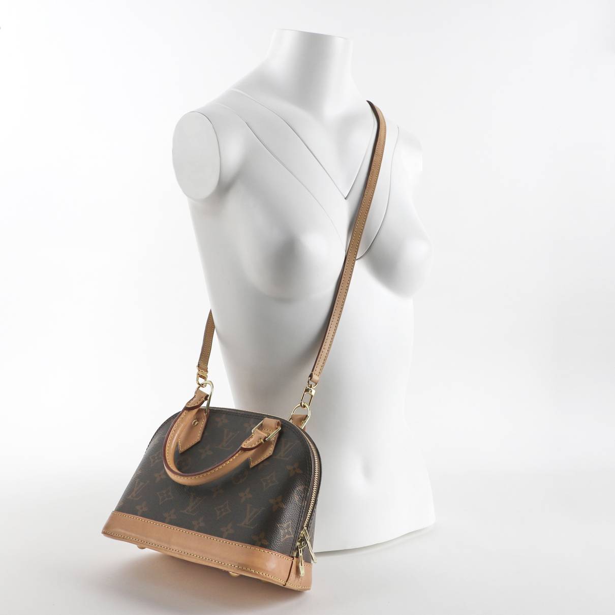 Alma cloth handbag Louis Vuitton Brown in Cloth - 19720872