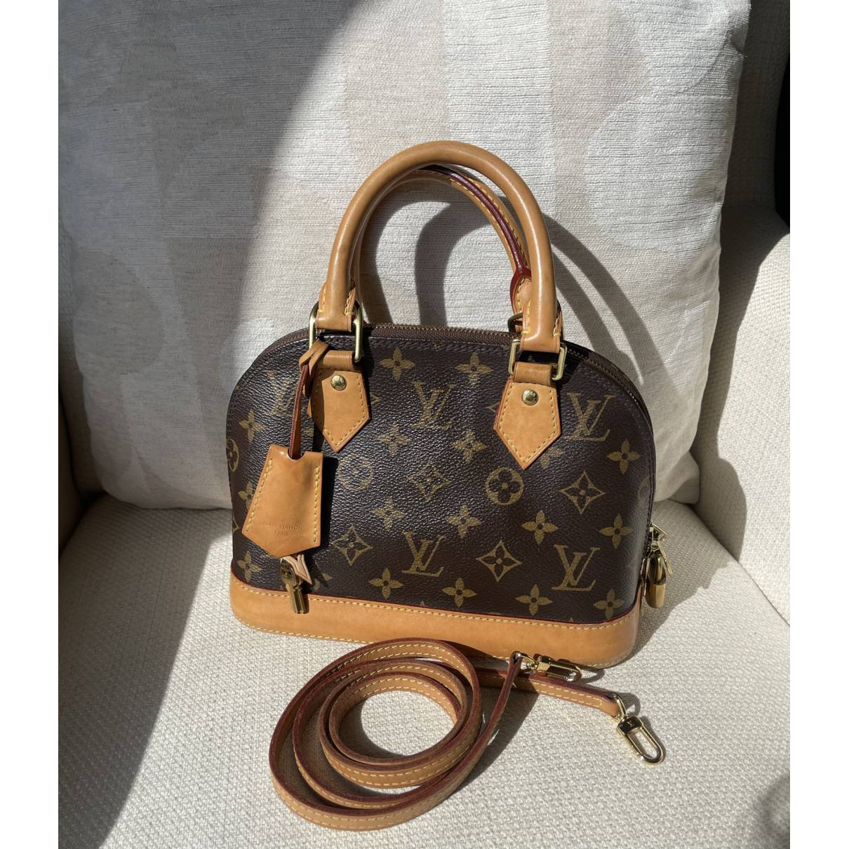 Alma bb leather handbag Louis Vuitton Brown in Leather - 35243138