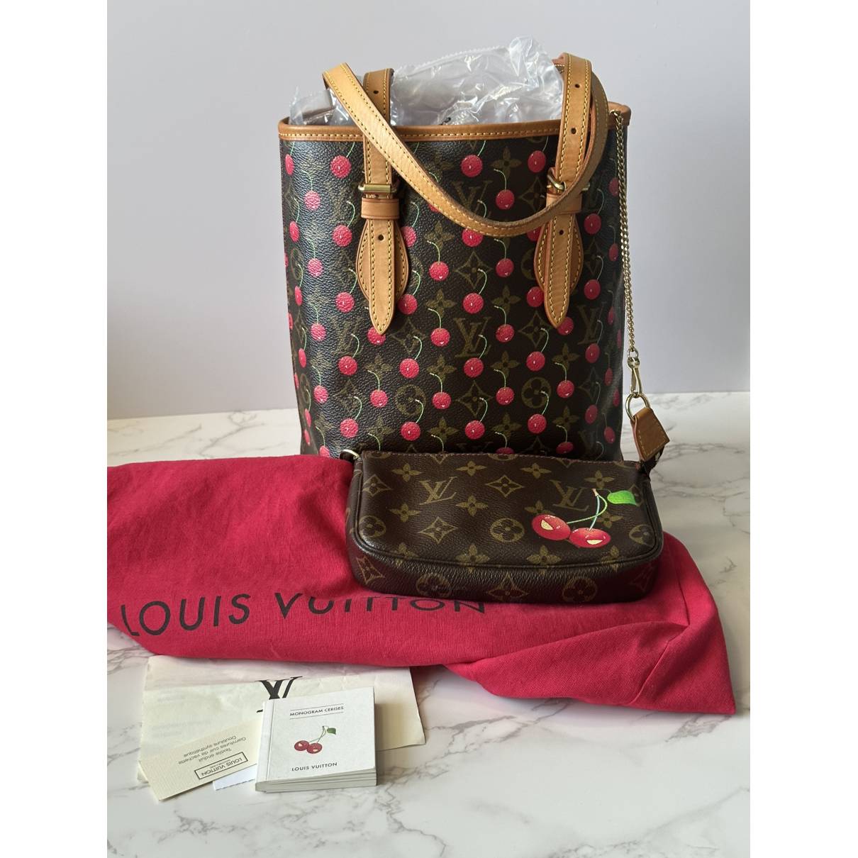 Authentic Louis Vuitton Cerises Bucket With Pouch for Sale in