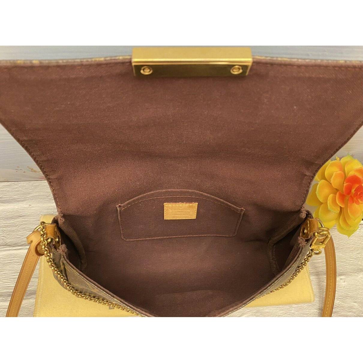 Cloth handbag Louis Vuitton Brown in Cloth - 25082156