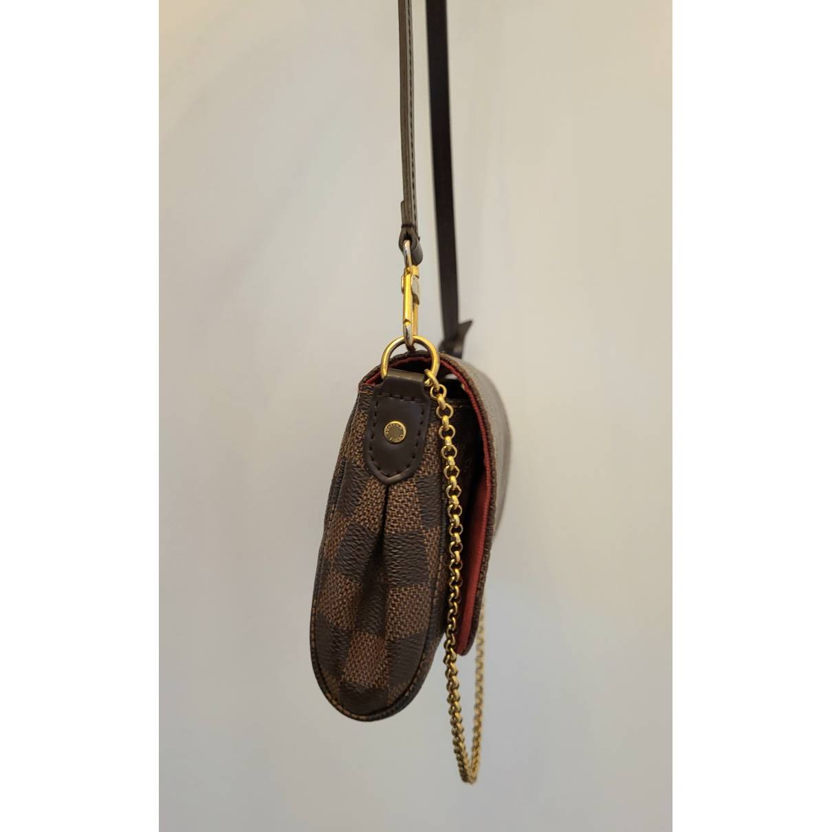 Cloth handbag Louis Vuitton Brown in Cloth - 36114935