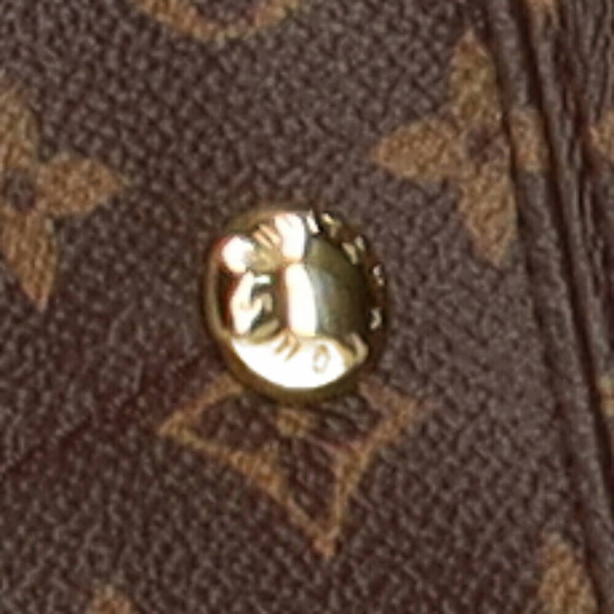 Cloth handbag Louis Vuitton Brown in Cloth - 23187040