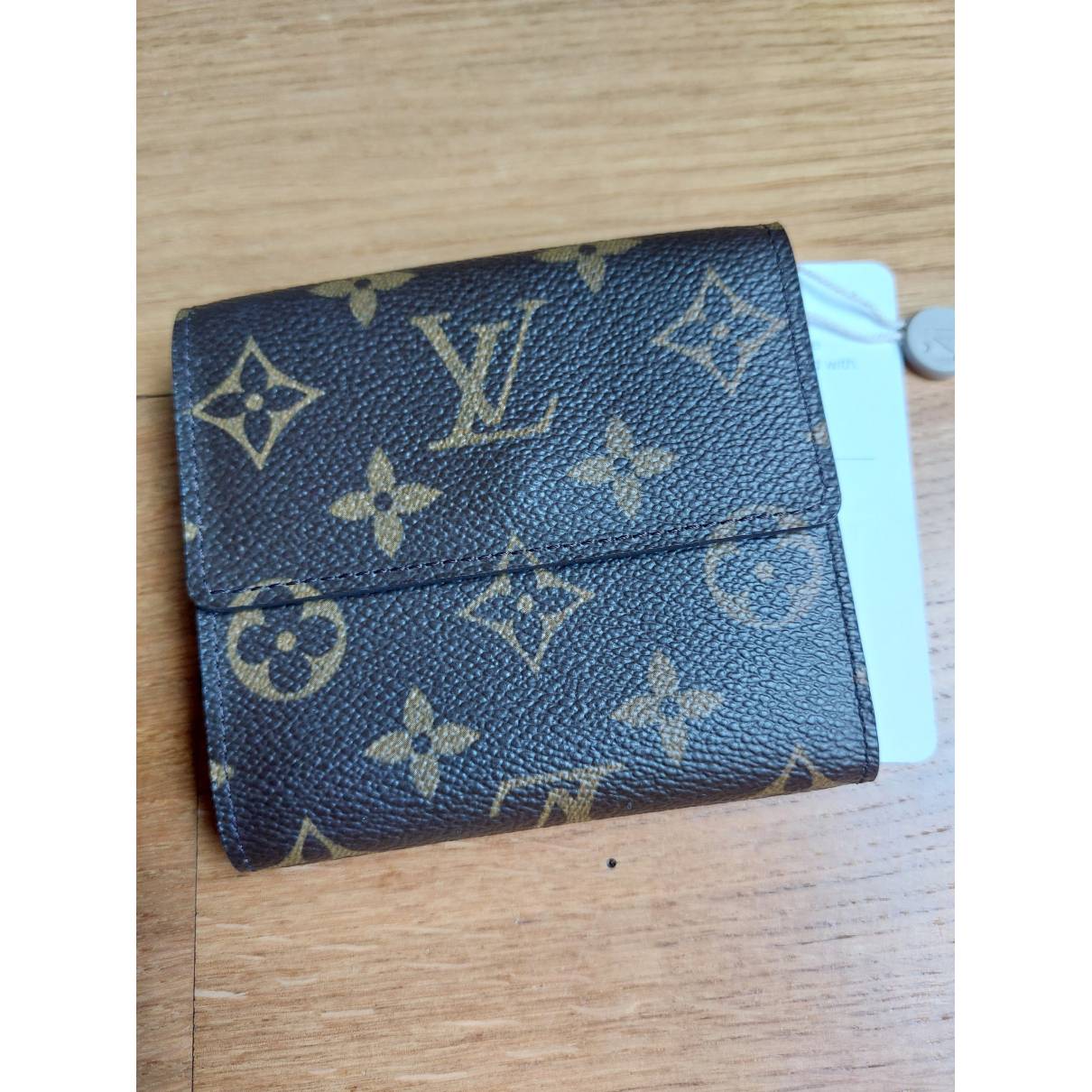Cloth purse Louis Vuitton Brown in Cloth - 36157535