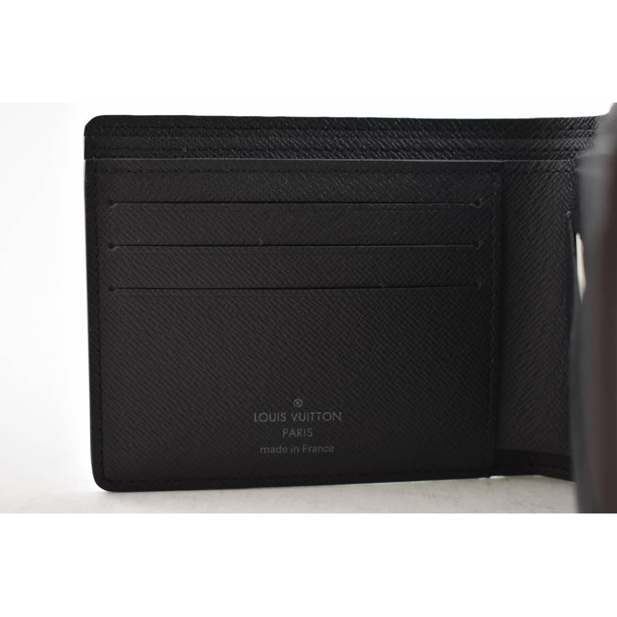 Cloth wallet Louis Vuitton Brown in Cloth - 25271624