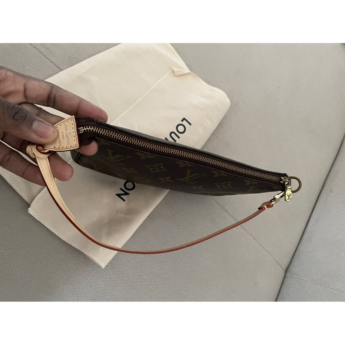 Pochette accessoire cloth handbag Louis Vuitton Brown in Cloth - 31251931