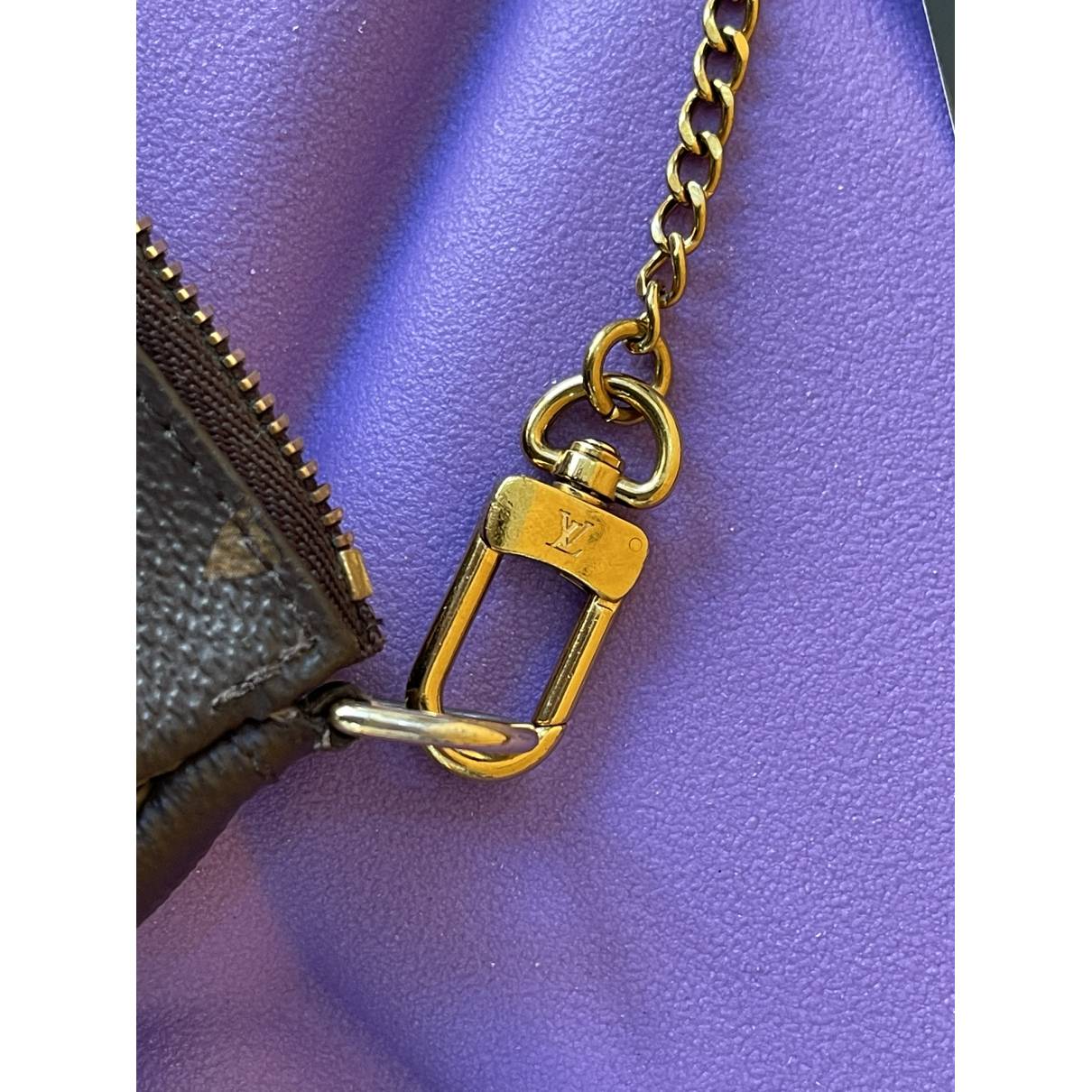 Pochette accessoire cloth handbag Louis Vuitton Brown in Cloth - 30883148