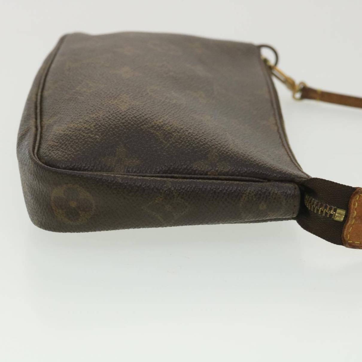 Pochette accessoire cloth handbag Louis Vuitton Brown in Cloth - 35028390
