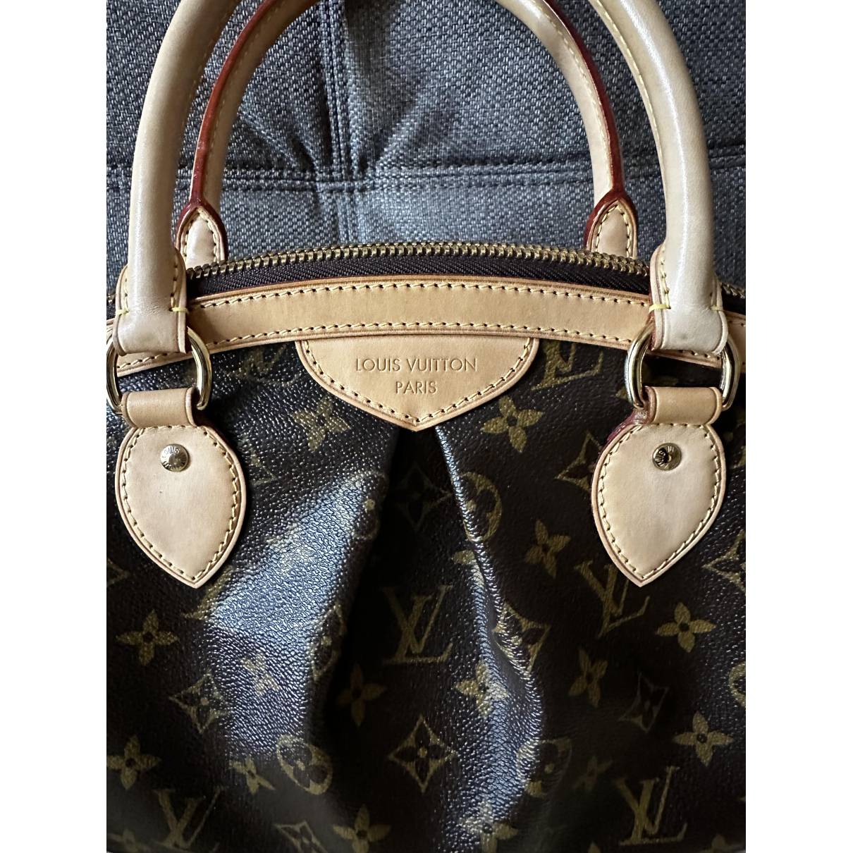 Tivoli cloth handbag Louis Vuitton Brown in Cloth - 30627123