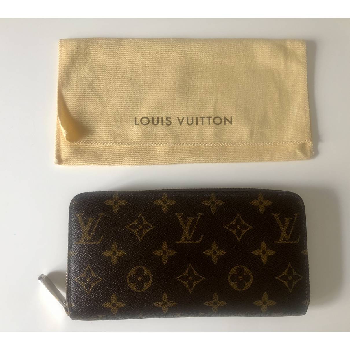 Zippy cloth wallet Louis Vuitton Brown in Cloth - 23387450